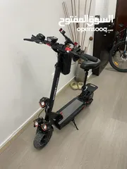  1 electric scooter with a seat