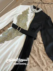  14 فستان ابيض و اسود ملبوس مره وحده بجنن عاللبس  بلبس لوزن 70 كيلو