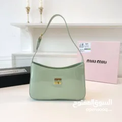  2 Miu Miu  الوان الموسم جمال و أنوثة وأناقة بقطعة واحدة فقط