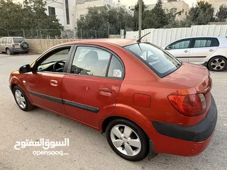  4 كيا برايد حمراء 2007