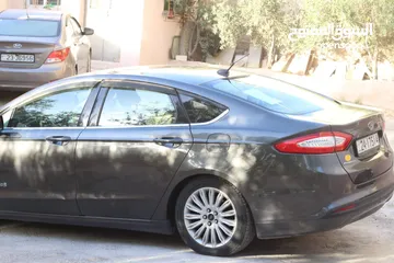  4 فورد فيوجن 2015 Se,كلين تايتل وفحص كامل وصيانة دورية،جير راكب جديد،مالك اول للسيارة واستخدام شخصي