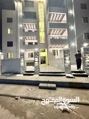  29 شقة فاخره طابق اخير مع روف بمساحة 205م للبيع في اربد مجمع عمان الجديد مقابل صالة مسايا