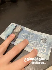  2 5 دولار كندي 2 دينار فقط