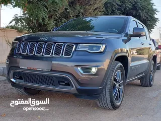  23 جيب جراند شيروكي فل الفل اعلى فئة بانوراما 2014 فحص كامل لون فيراني مميز بسعر مغري قابل للبدل والاقص