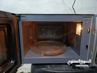  4 ميكرويف سونا لون سلفر واسود 25لتر حجم صغير  شغال ميه بالميه فحص يوجد توصيل قابل للتفاوض
