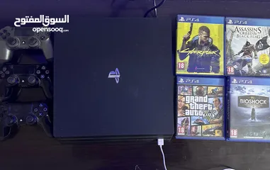  1 PS4 pro 1000gb with 5 games and 3 controllers