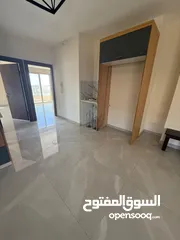  3 شقة جديدة غير مفروشة للإيجار – عين منجد (قرب مطعم تغميسة وعلى مقربة من جميع الخدمات)
