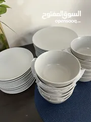  4 IKEA brand dining plates and bowls