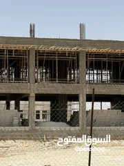  10 ارض في الجيزه على شارعين مقابل مجمع الدوائر