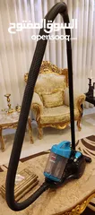  3 بداعي السفر ..مكنسة كهراباء ماركت بيسيل Bissell Easyvac Bagless  1200W