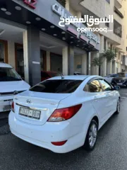  4 هونداي اكسنت 2015 محرك 1600 ديزل لون ابيض فرش جلد تشغيل بصمه حساسات خلفيه كاميرا خلفيه ترخيص وتامين