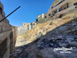  1 ارض ومنزل للبيع في ماركا نمره ثنين عن الشارع والسوق وفي دخله ع الارض من الخلف