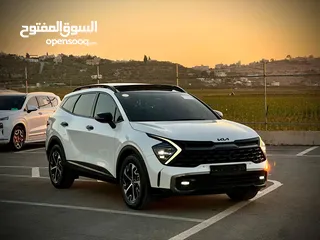  7 كايا سبورتاج /2022 فل الفل فتحة سقف  2x4 ///240Hp بنزين + كهرباء  ( Haybrid) 1600cc