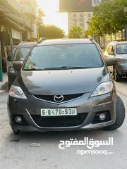 4 مازدا 5 ستيشن بابين سحاب ماتور 2000cc بدون تيربو هيك بجين هضول كراسي اماميات تدفئه كزاز كهرباء بنزين