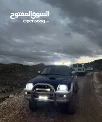  10 متسوبيشي ماقنومL200 2001