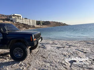  11 للبيع - جيب شيروكي XJ موديل 1999  جاهز للبر والمغامرات!