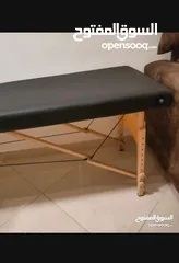  1 تخت مساج رجلين خشب