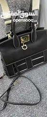  16 شنطة جلد طبيعي ( salvatore ferragamo calfskin thestudiocagebagsella) صناعة ايطالية