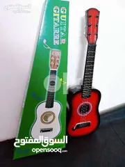  4 جيتار كلاسك تعليمي   خشبي  6 اوتار معدنيه