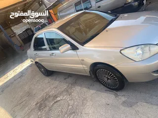  1 ميتسوبيشي لانسر 2012