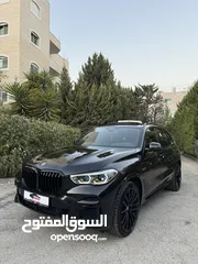  1 BMW X5 45e 2022 كهرباء بنزين محرك 3000  400 حصان دفعه اولى وشكات 36 شهر بدون بنوك أو مؤسسات