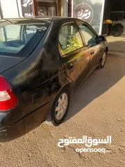  11 كيا تشوما موديل 1999