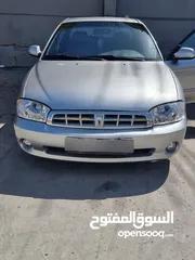  2 كيا سبيكترا 2001 بسعر 2400 جير عادي سياره نظيفه جدا  kia spectra 2001