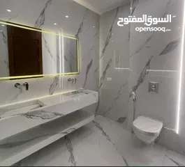  21 شقة فاخرة بإطلالة  مميزة بارقى مناطق عمان الغربية الجبيهة ارضي واخير مع رووف وطوابق