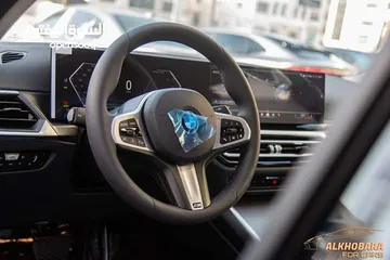  7 Bmw i3 e-drive 40L Ev M kit 2024 ( night)  كفالة 3 سنوات او 50,000 كم