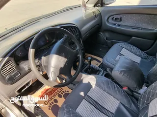  10 كيا سبيكترا 2001 بسعر 2400 جير عادي سياره نظيفه جدا  kia spectra 2001