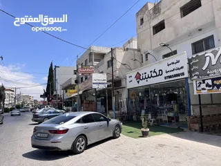  2 عقار للبيع على ثلث شوار ،تجاري ،اربع مخازن عالشارع الرئيسي  وطابقين سكن او مكاتب ،مساحة البناء 250م