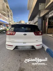  13 كيا نيرو 2019 -الاتصال على رقم الوطنيه في الوصف