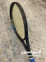 26 كرات تنس إرضي ومضارب