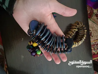  14 اساور خشبية ملونة جديدة