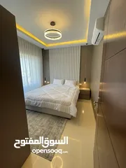  10 شقه استثمارية  للبيع او للايجار مفروش في الخامس - ref : 14676