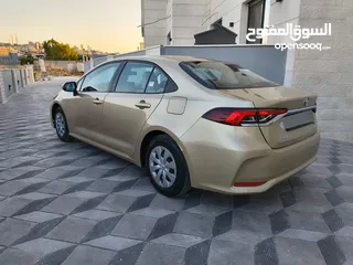  17 تويوتا كورولا 2021 لون شمباني بنزين اصلي ماتور cc1600 فحص كامل جمرك حديث