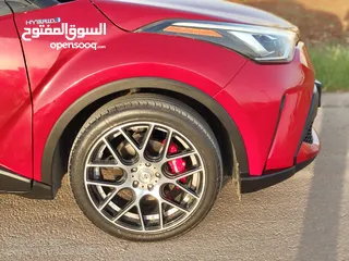  15 Toyota chr hybrid 2022 لون احمر ميتالك ، جنط ياباني قياس 19، فحص 4 جيد، وارد خليجي