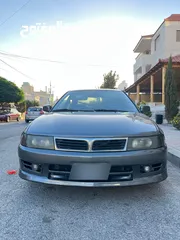  1 متسوبيشي لانسر موديل 1999 بحاله الوكاله