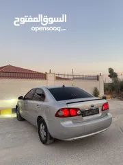  5 كيا لوتزي 2006 3 جيد لون سلفر ماتور 2000cc