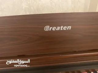 7 Greaten piano new model amazing brownish black color no key broken functioned with metronome
