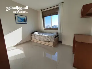  3 شقة بإطلالة عالية في قلب عين منجد – فرصة لا تعوّض