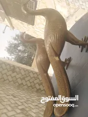  2 طاووس عدد 2 نحاس اصلي وزن الواحد منهم كيلو ونص للبيع الاثنين ب 65 دينار