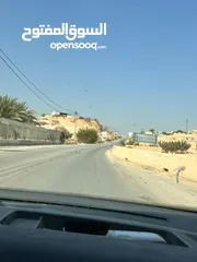  1 ارض للبيع في دير ابزيع  تيجاري ع شارع فرعي
