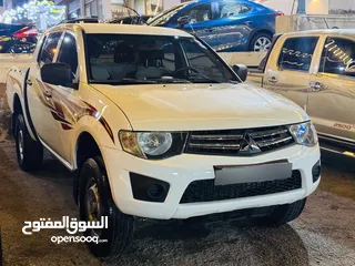  4 L200 2015 بحالة الوكاله متسوبيشي