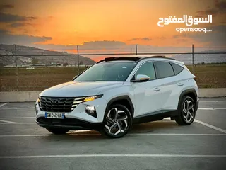  3 هونداي توسان/2022 Plug In فل الفل فتحة سقف بانوراما  4x4 ///271Hp   ( Haybrid) 1600cc