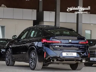  4 BMW X4 XDRIVE 30i 2024 فل كامل الناغي كاربون بلاك