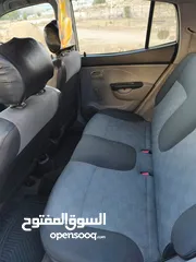  5 كيا بيكانتو 2006 لون ابيض (اتوماتيك)