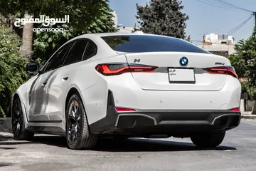  8 Bmw I4 e-drive 35 2023 gran coupe   السيارة مميزة جدا و قطعت مسافة 6,000 كيلو متر فقط