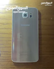  1 Samsung s6 , 64 gega الملحقات الموجوده شاحن