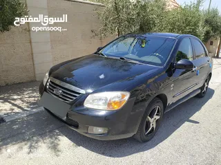  2 كيا سيراتو ترخبص 2007/فل الفل  جولد/فحص كراتين